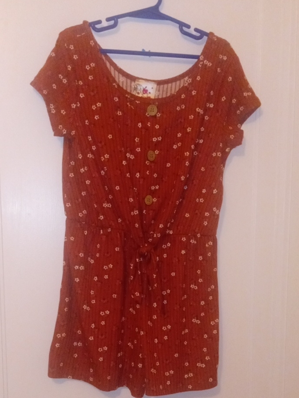 girl 10 mauve short romper with flower print